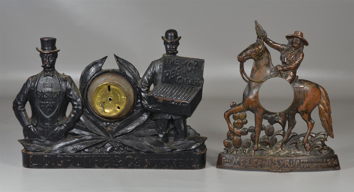 Appraisal: Cast iron figural advertising clock frames lacking movements The Boston