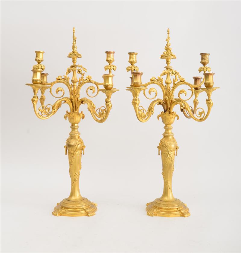 Appraisal: PAIR OF LOUIS XVI STYLE GILT-BRONZE SIX-LIGHT CANDELABRA SUSSE FRERES