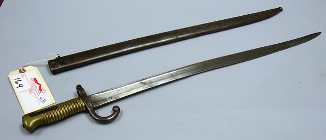 Appraisal: French Model sword bayonet blade dated with iron scabbard