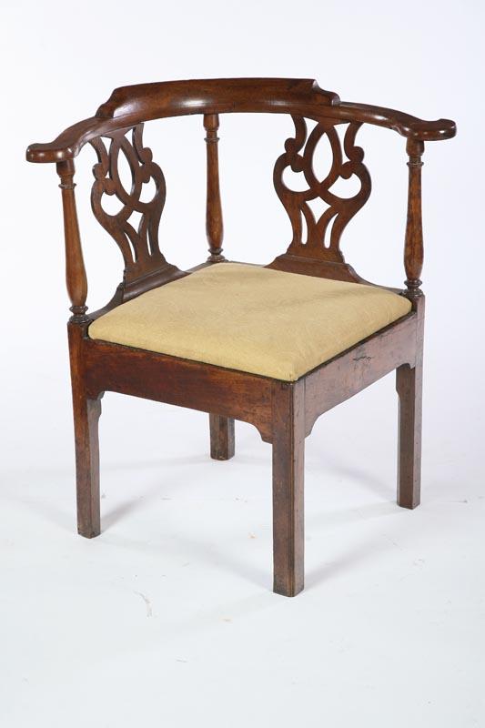 Appraisal: GEORGE III CORNER OR ROUNDABOUT CHAIR English th century mahogany