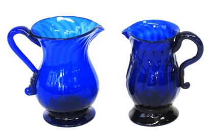 Appraisal: Two Stiegel type blown cobalt glass footed creamerscirca and