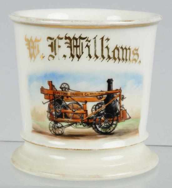 Appraisal: Keystone Steam-Operated Well Driller Shaving Mug Description Very unique image