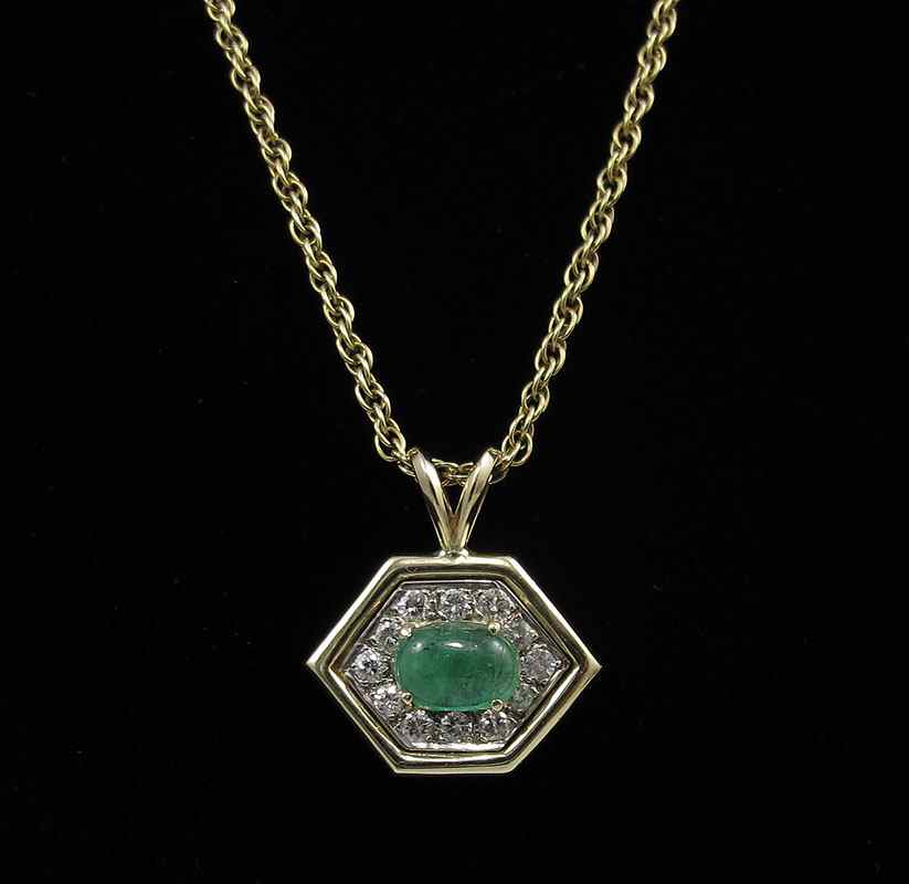 Appraisal: K EMERALD DIAMOND NECKLACE K yellow gold octagonal pendant centers