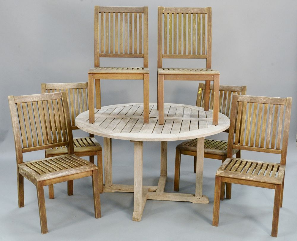 Appraisal: Seven piece outdoor teak set includes round dining table ht