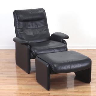 Appraisal: De Sede black leather reclining armchair ottoman De Sede black