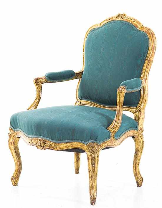 Appraisal: Louis XV style giltwood fauteuil late th century carved molding