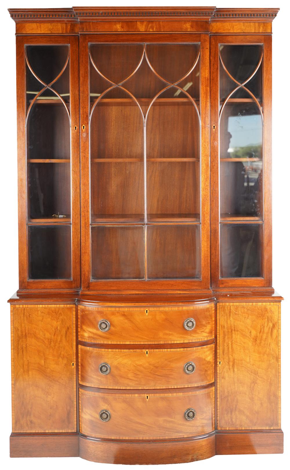 Appraisal: GEORGIAN-STYLE MAHOGANY BREAKFRONT CABINET th century constructed in one piece