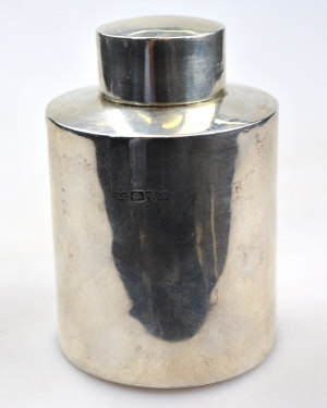 Appraisal: A late Victorian silver cylindrical tea caddy with cover Nathan