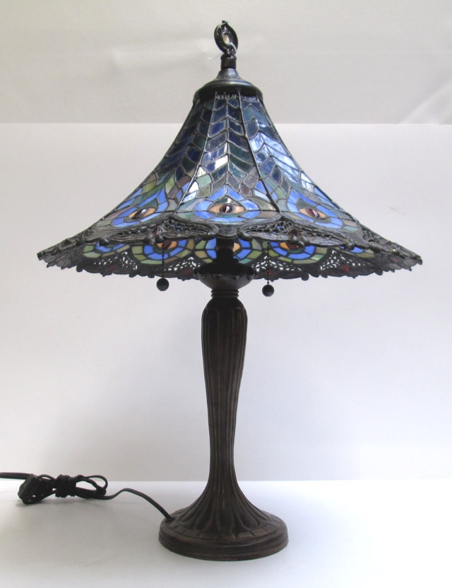 Appraisal: STAINED AND LEADED GLASS TABLE LAMP with peacock feather design