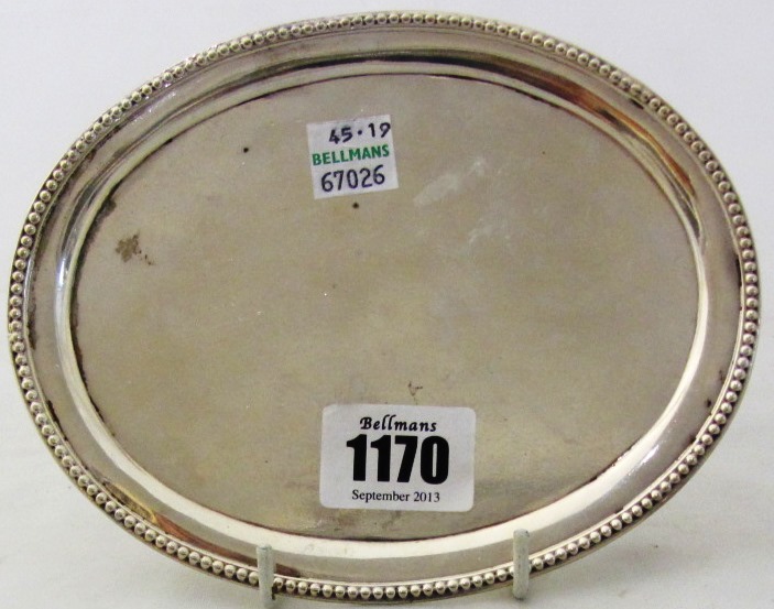 Appraisal: A George III Scottish silver teapot stand of oval form