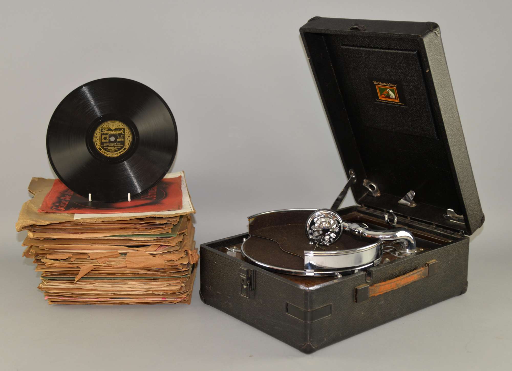 Appraisal: His Masters Voice portable gramophone and a quantity of rpm