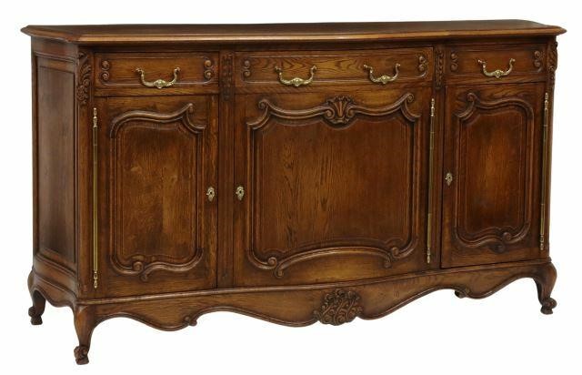 Appraisal: French Louis XV style oak sideboard th c serpentine-front case