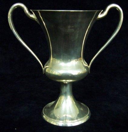 Appraisal: A prize cup of two-handled pedestal form cm high