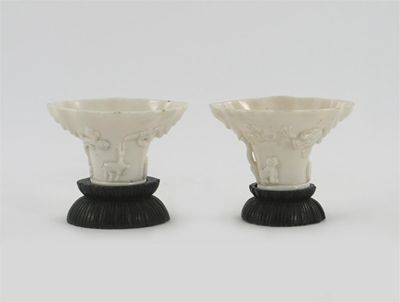 Appraisal: Two Chinese blanc de Chine libation cups moulded and applied