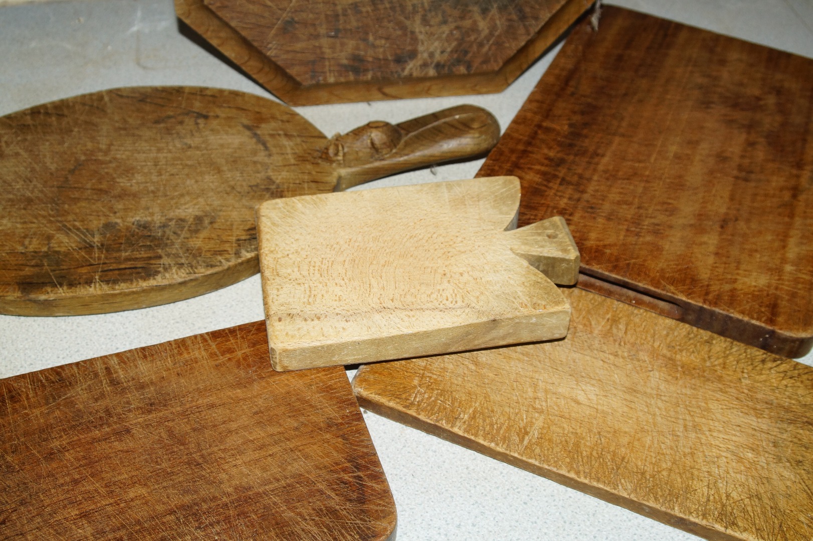 Appraisal: Two Robert Thompson of Kilburn 'Mouseman' bread boards and four