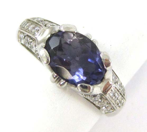 Appraisal: TANZANITE DIAMOND AND EIGHTEEN KARAT WHITE GOLD RING with ten