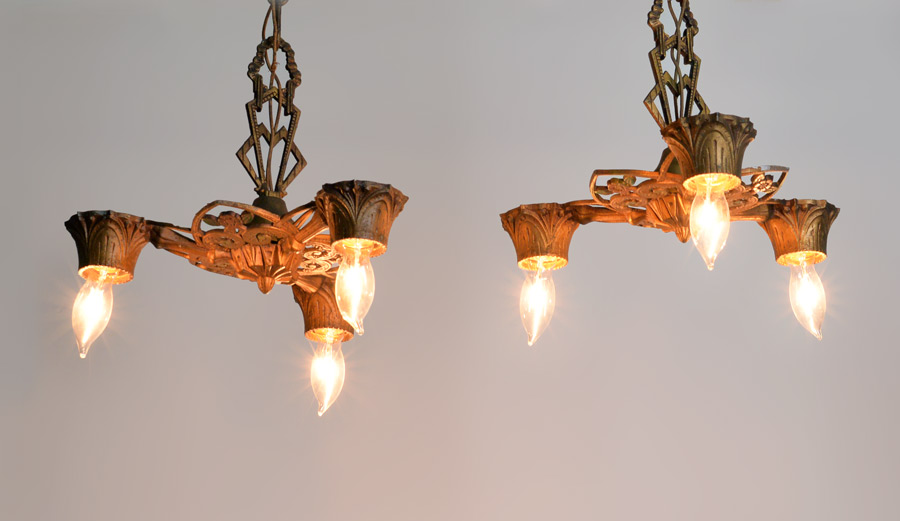 Appraisal: PAIR OF ART DECO LIGHT HANGING LIGHTS Gold decorated spelter