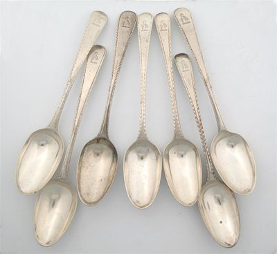 Appraisal: Seven various George III feather edge dessert spoons all crested