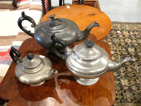 Appraisal: LOT THREE ASSORTED PEWTER TEAPOTS The first and smallest lobed