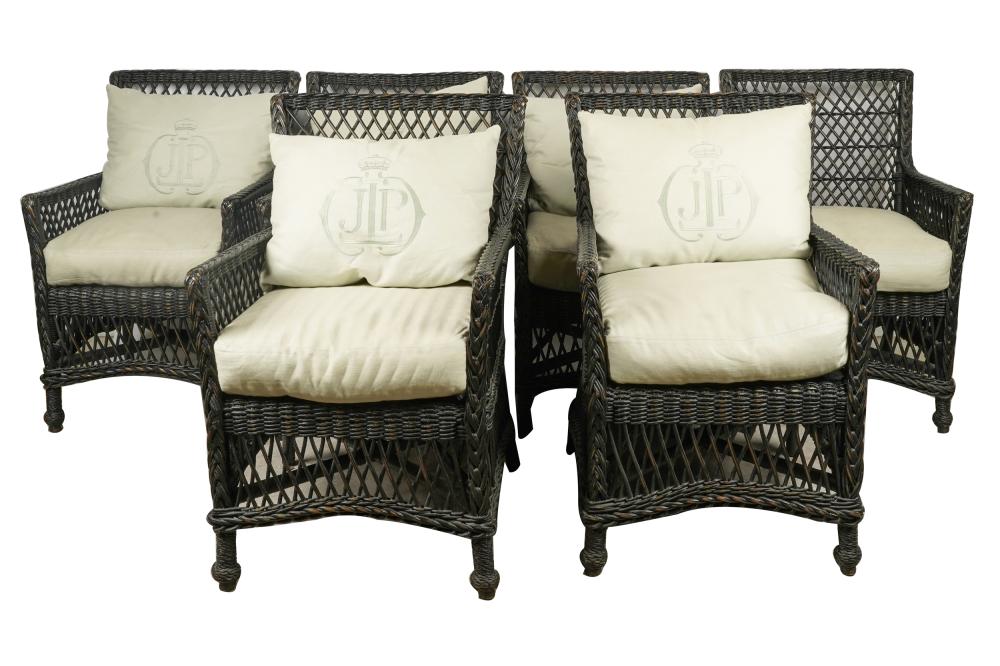 Appraisal: SIX WICKER ARMCHAIRSwith dark brown finish each with loose cushion