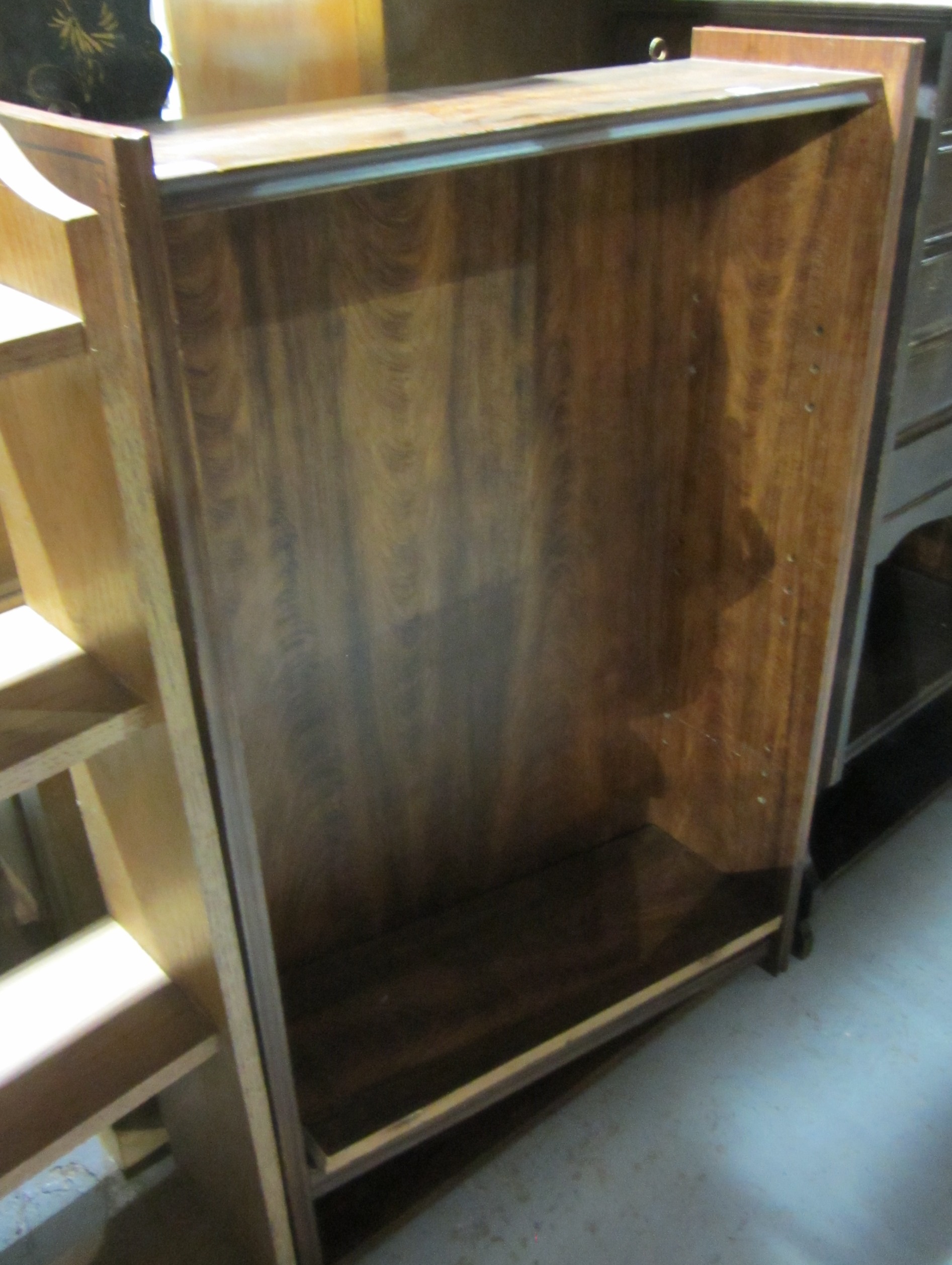 Appraisal: A th century faux walnut bookcase