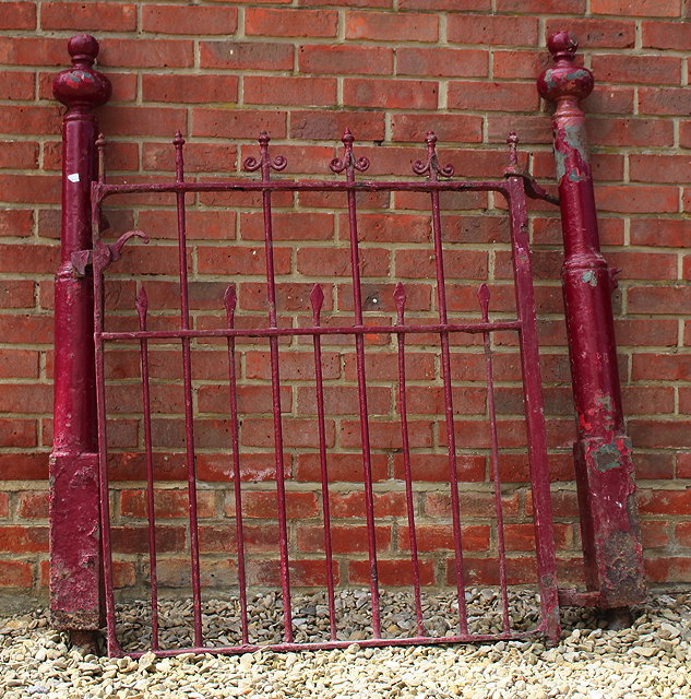 Appraisal: A RED PAINTED VICTORIAN WROUGHT IRON GARDEN GATE the cast