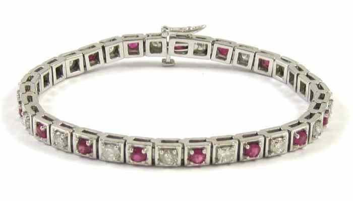 Appraisal: RUBY DIAMOND AND FOURTEEN KARAT GOLD BRACELET The white gold