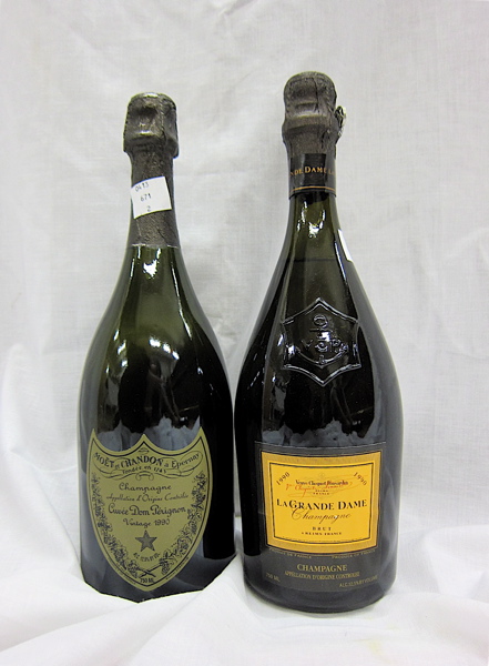 Appraisal: TWO BOTTLES VINTAGE FRENCH CHAMPAGNE Moet Chandon Dom Perignon Brut