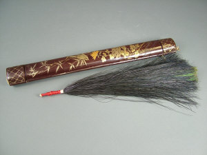 Appraisal: An early th century Chinese peacock feather plume in a