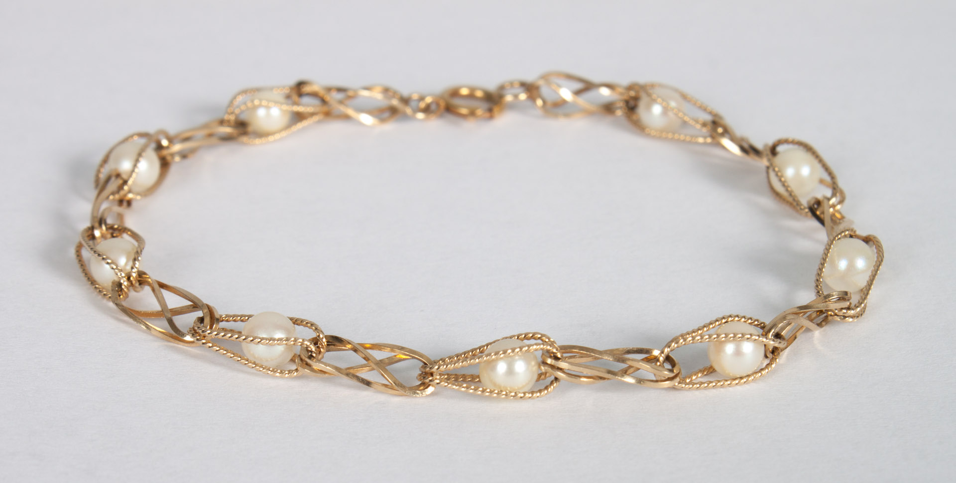 Appraisal: Lady's K gold and pearl link bracelet in L grams