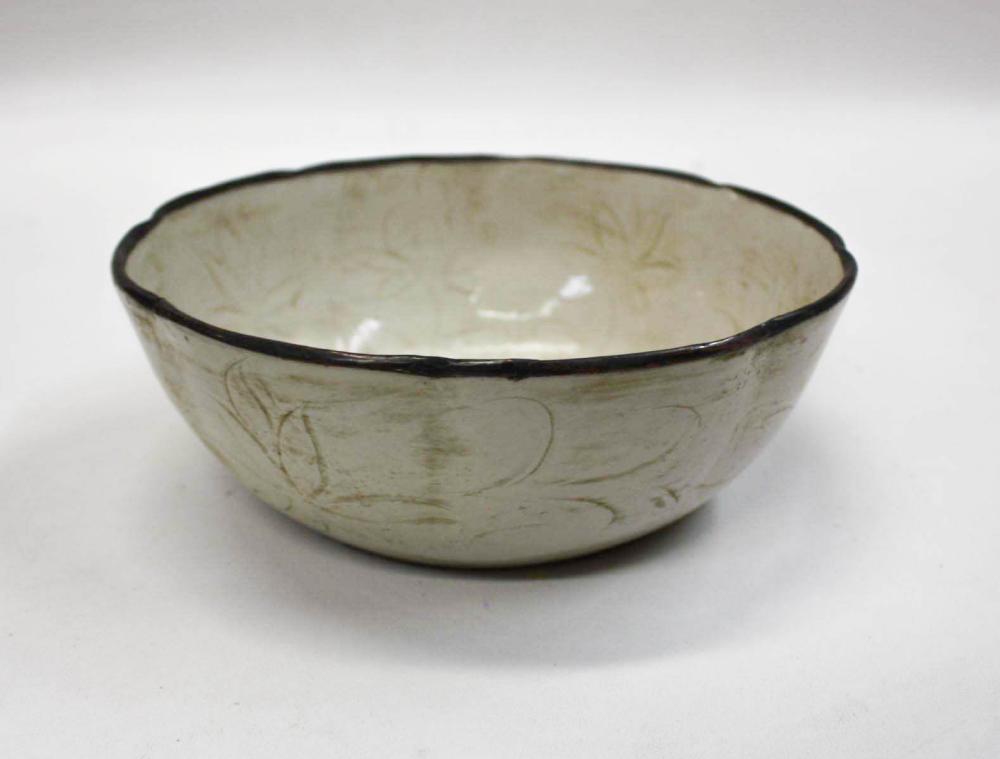 Appraisal: CHINESE DING WARE PORCELAIN BOWL circular form of low profile