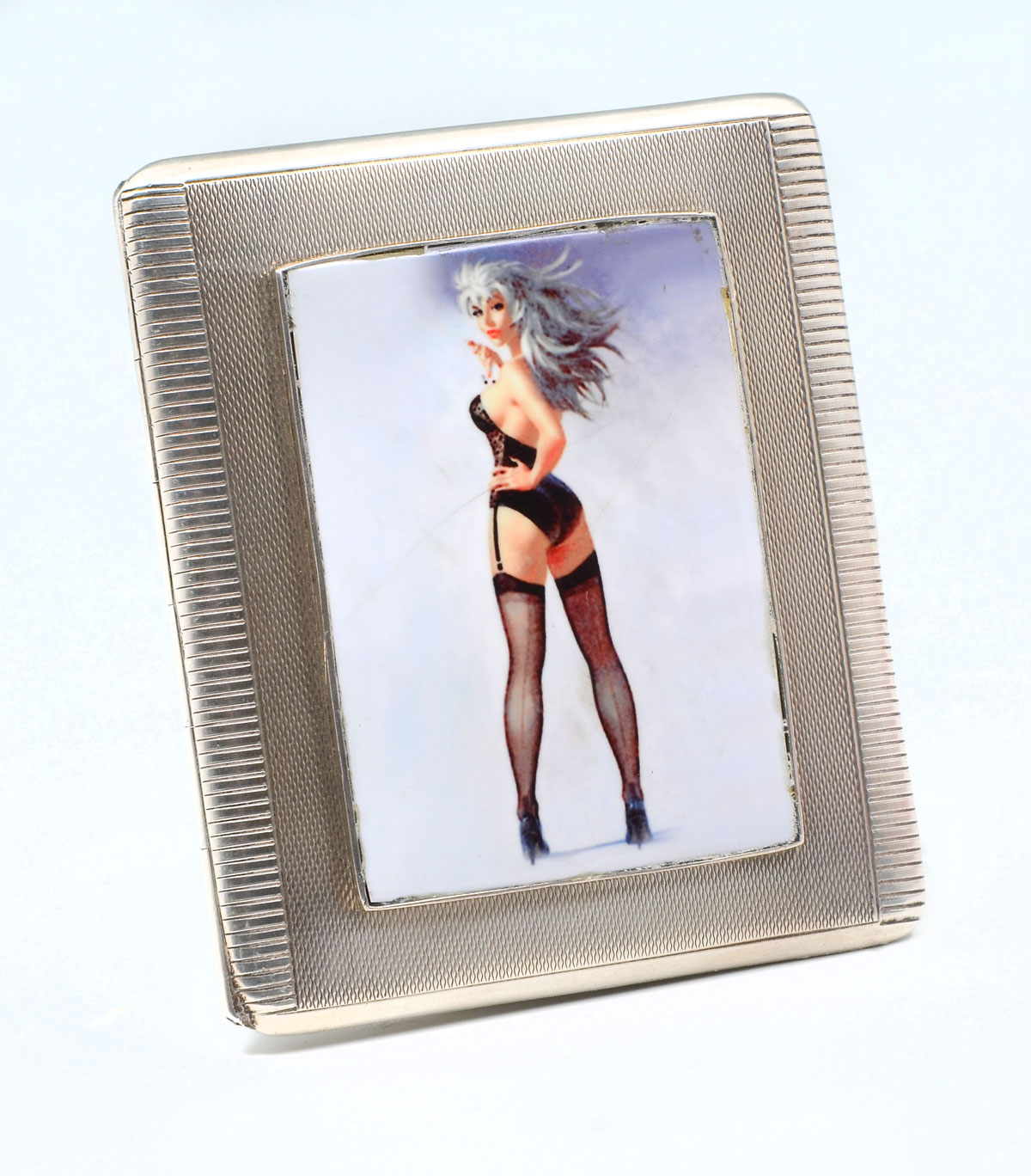 Appraisal: SLIPWAY STERLING CIGARETTE CASE WITH PINUP GIRL INSERT Sterling case