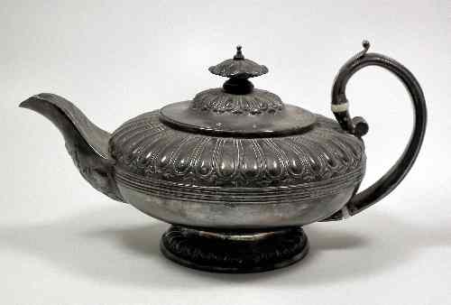 Appraisal: A George IV silver teapot with squat part gadrooned body