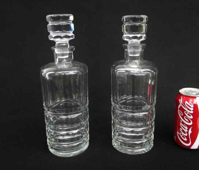 Appraisal: Pair clear glass decanters with stoppers '' Ht