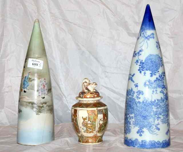 Appraisal: TWO JAPANESE PORCELAIN WALL POCKETS of conical form with figure