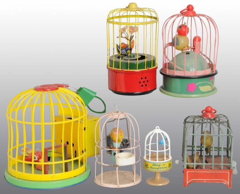 Appraisal: Lot of Bird in Cage Wind-Up Toys Description German and