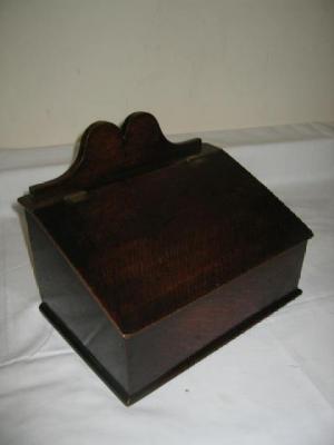 Appraisal: AN OAK SALT BOX of oblong form with raised scroll