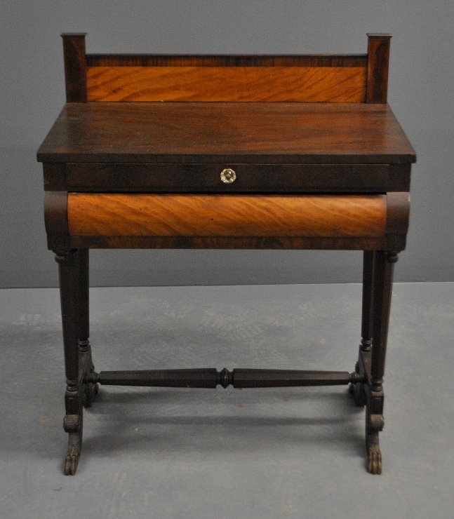 Appraisal: - Empire mahogany table with backsplash and a slotted drawer