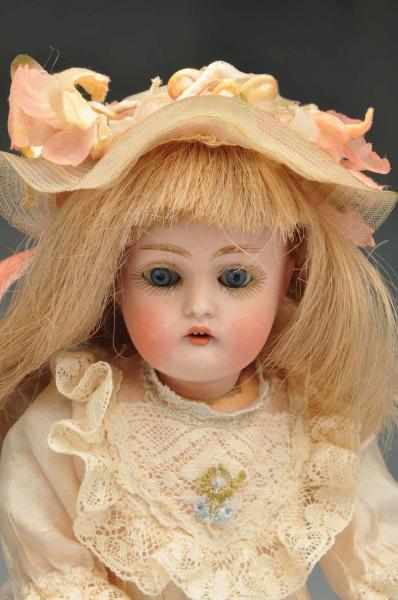 Appraisal: German Bisque Kestner Child Doll Description Bisque socket head blue