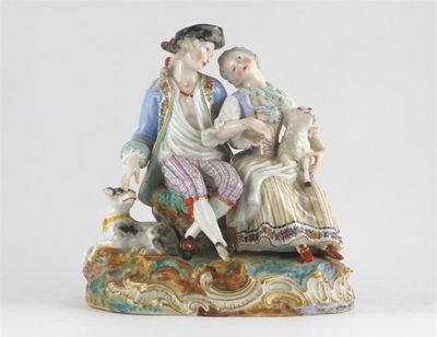 Appraisal: A Continental porcelain group of a courting shepherd and shepherdess