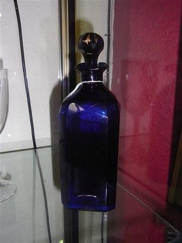 Appraisal: A TH CENTURY BRISTOL BLUE GLASS DECANTER inscribed in gilt