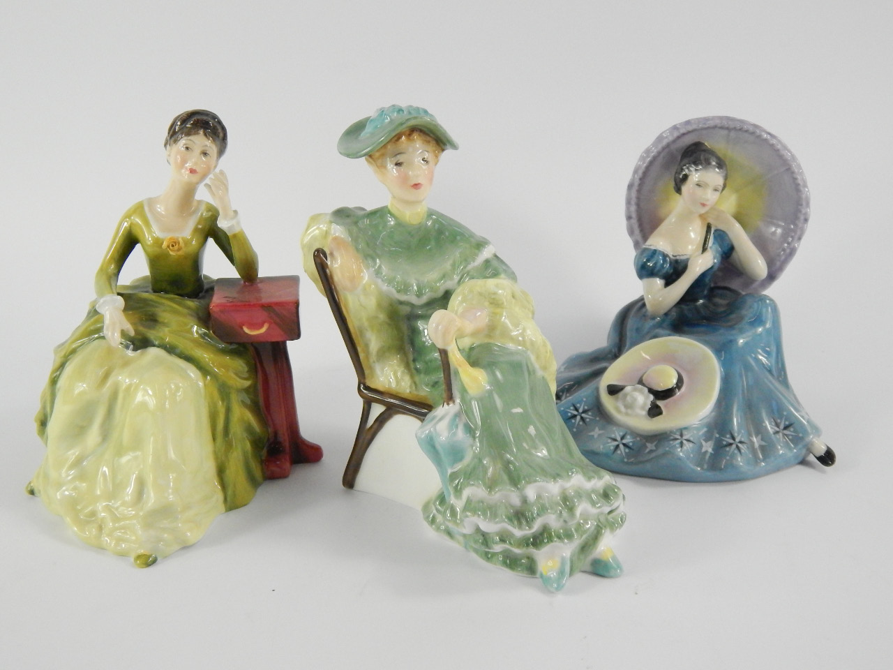 Appraisal: Three Royal Doulton figures comprising Pensive Moments HN Ascot HN