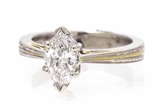 Appraisal: A Platinum Karat Yellow Gold and Diamond Ring Tacori containing