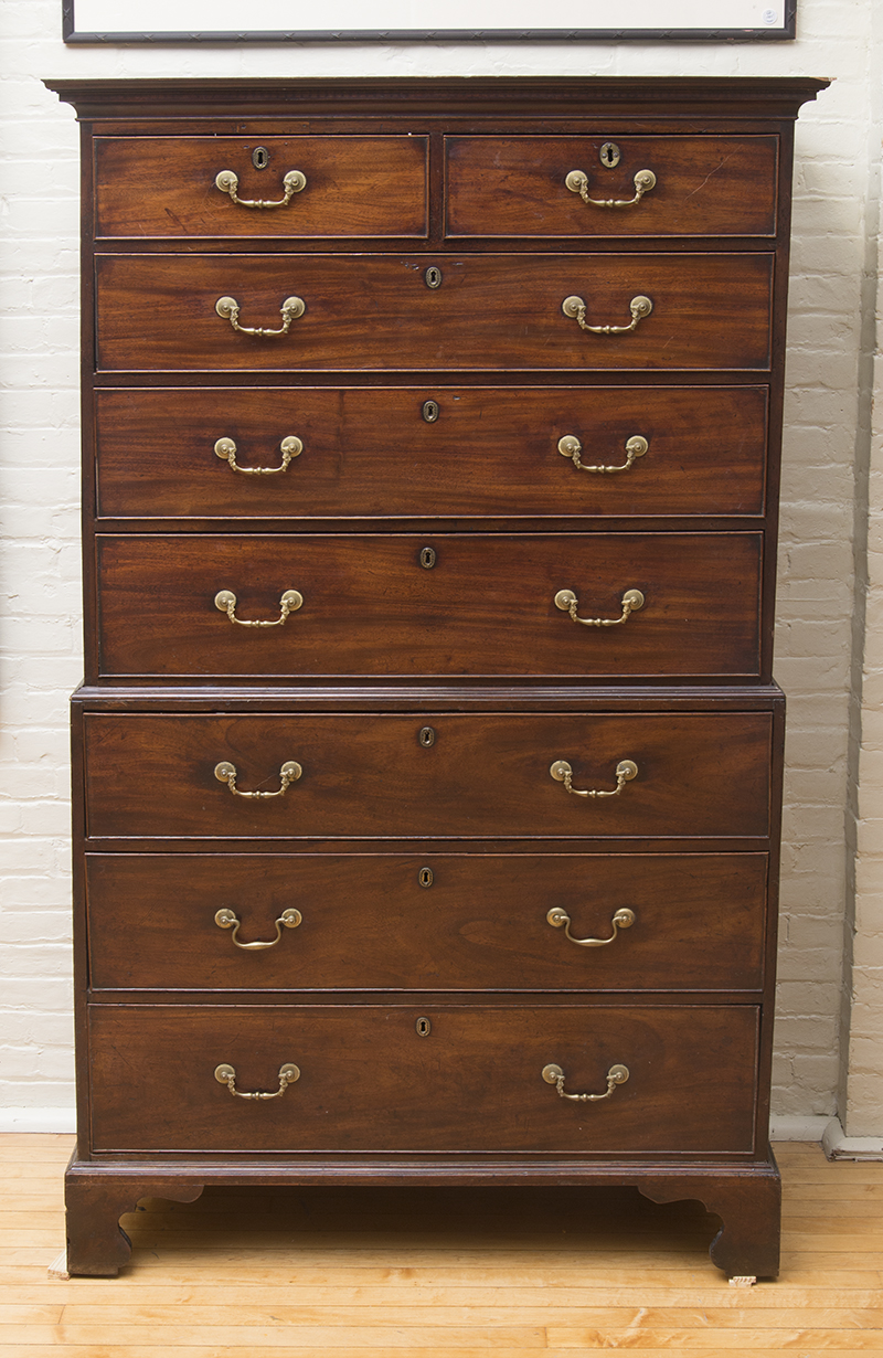 Appraisal: GEORGE III MAHOGANY CHEST ON CHEST The overhanging cornice above