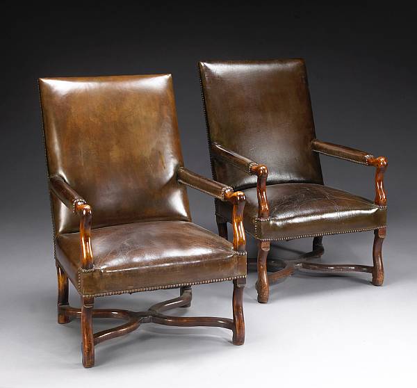 Appraisal: A pair of Louis XIV walnut fauteuils first half th