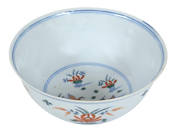 Appraisal: A CHINESE DOUCAI-ENAMELLED 'DUCK AND LOTUS' BOWL QING DYNASTY -