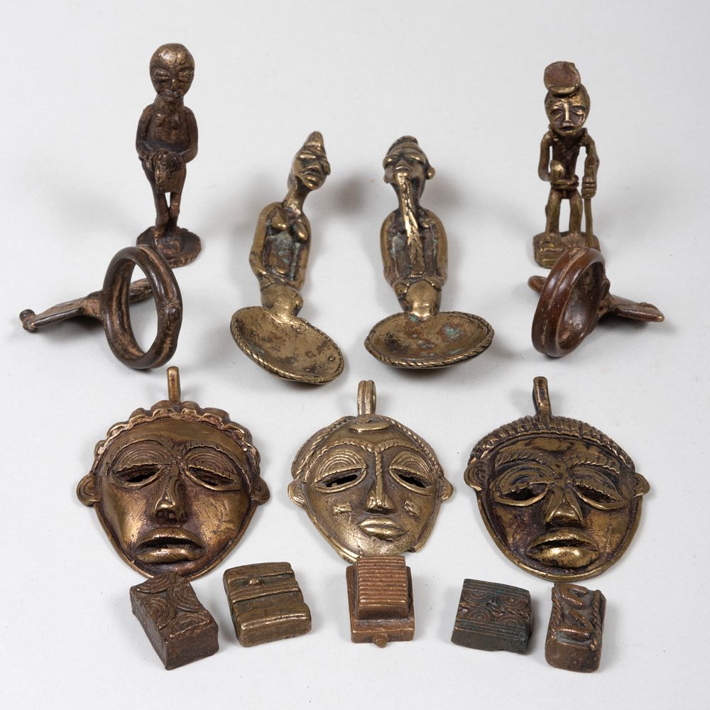 Appraisal: Group of African Cast Metal Pendant Masks and Ethnographica Comprising