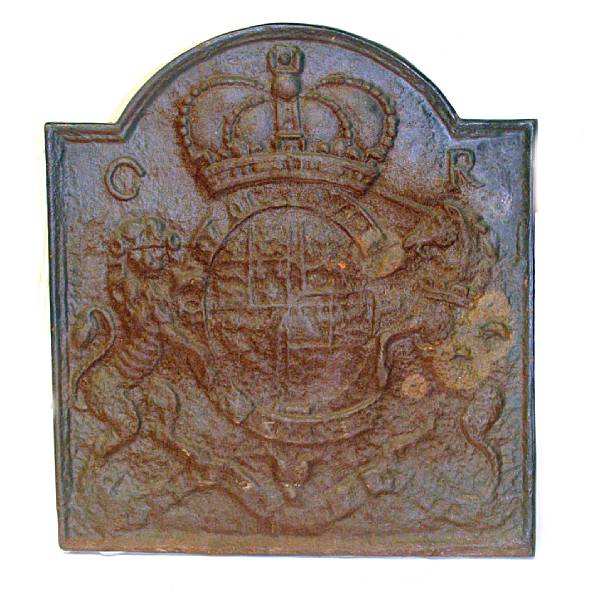 Appraisal: A cast iron fireback centered by the English royal coat