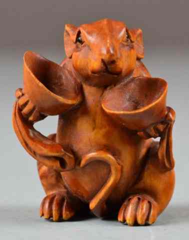 Appraisal: A Fine Japanese Carved Boxwood NetsukeFinely carved to seated rat