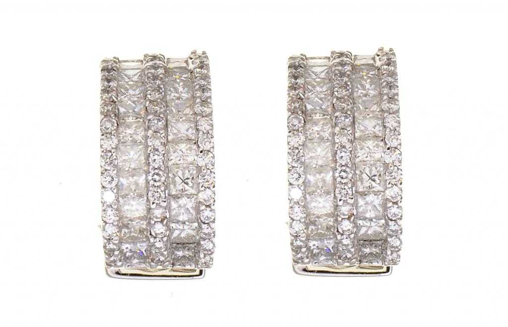 Appraisal: A PAIR OF DIAMOND EARRINGS of hoop design and set